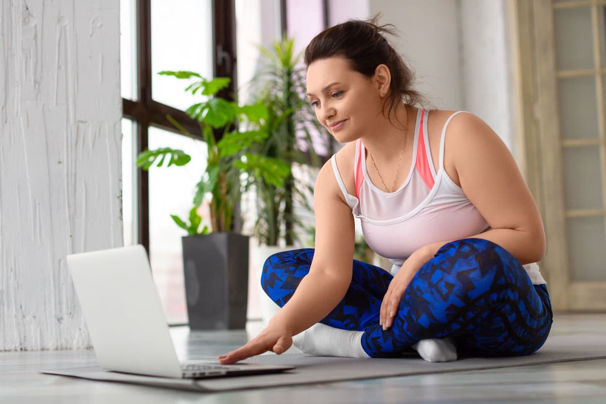 woman-taking-online-exercise-course